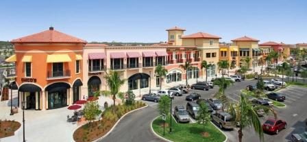 Shops and palms at Coconut Point in Estero